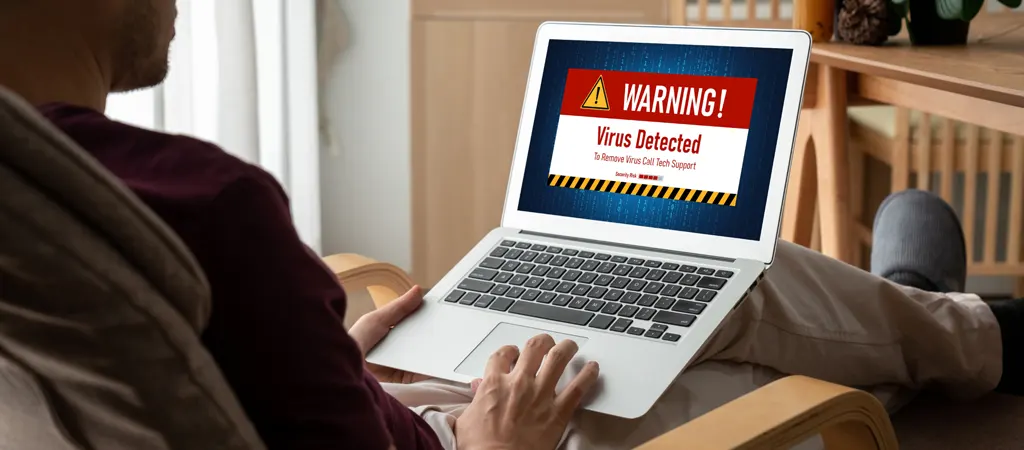 WordPress weboldal karbantartás hiánya miatt vírusfertőzésre figyelmeztető üzenet a weboldal megnyitásakor laptopon.